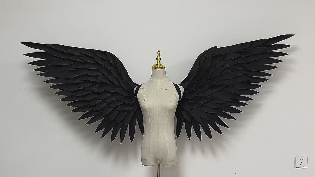 Our black angel wings video. Made from EVA foam feathers. Wings for angel wings costume or devil wings costume. Suitable for photoshoots.