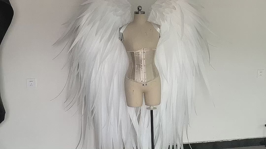 Our white angel wings video. Made from pearl cotton foam and some goose feathers. Wings for angel costume. Suitable for photoshoots.