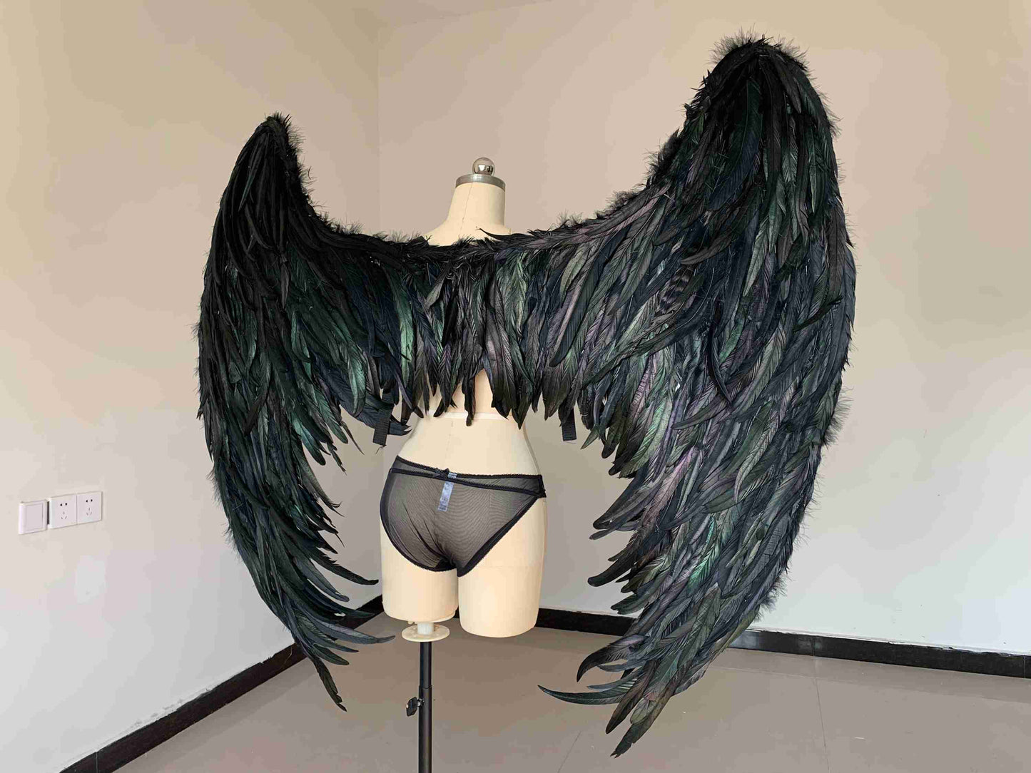 Our crow wings from the back. Made from goose feathers. Wings for ravens costume or devil costume. Suitable for photoshoots.
