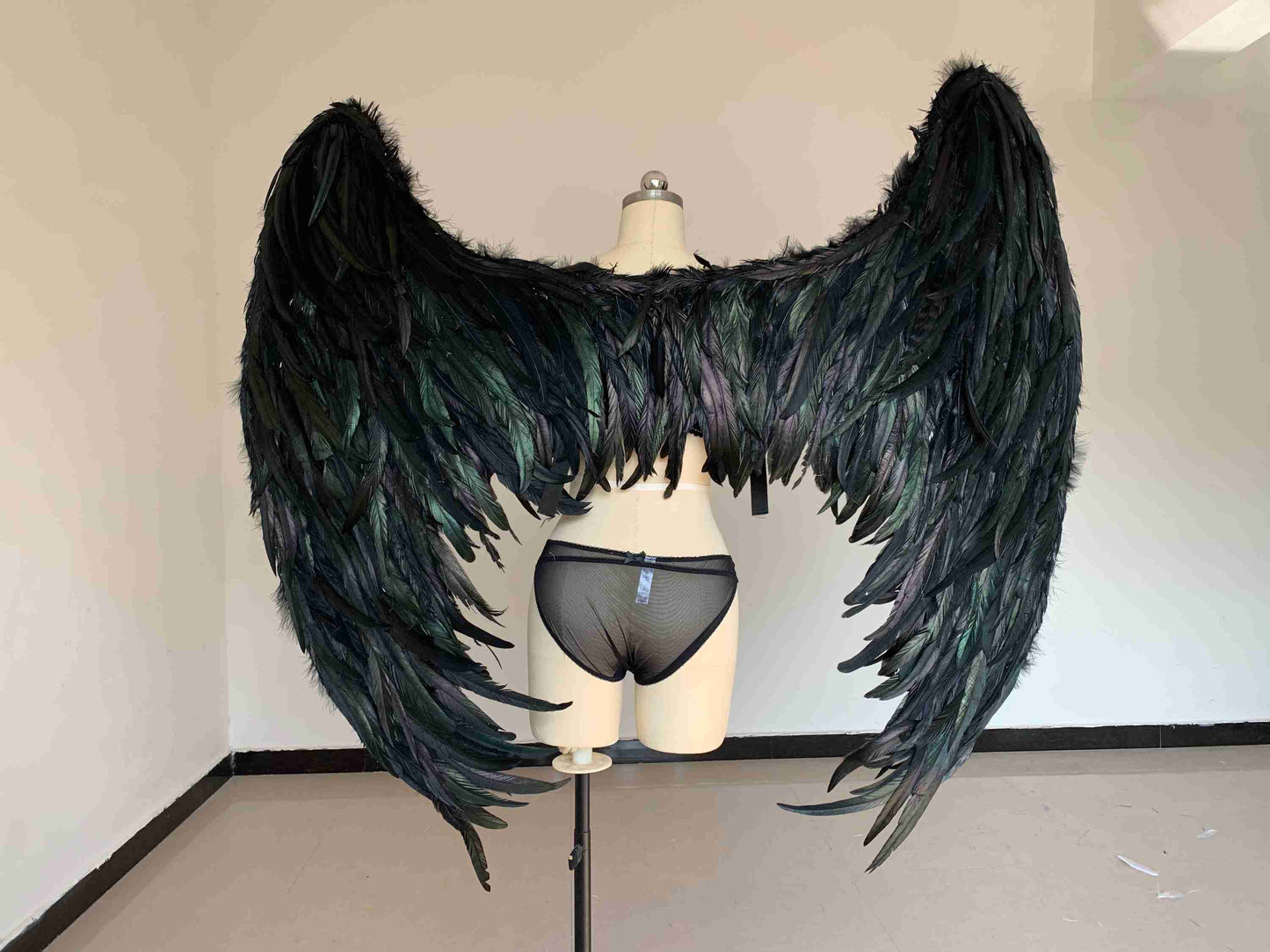 Our ravens wings from the back. Made from goose feathers. Wings for ravens costume or devil costume. Suitable for photoshoots.