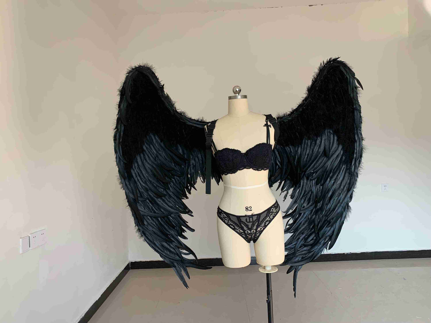 Our ravens wings from the front. Made from goose feathers. Wings for ravens costume or devil costume. Suitable for photoshoots.
