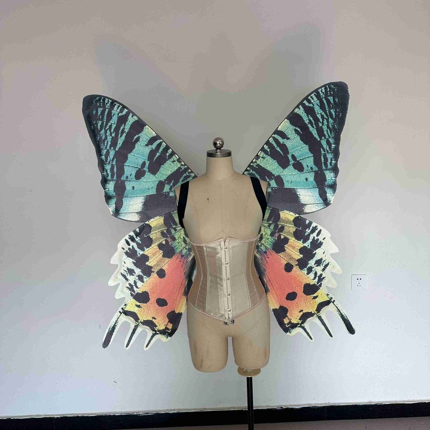 Our sky orange butterfly wings from the front. Made from cloth. Can be also named fairy wings or pixie wings.