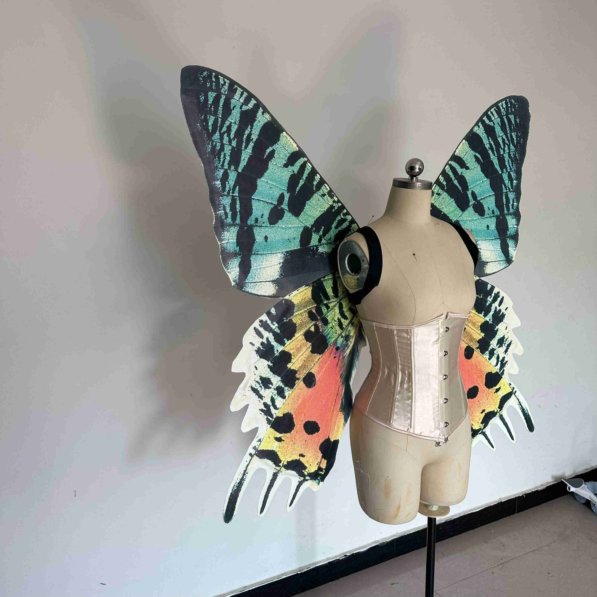 Our sky orange butterfly wings from the right side. Made from cloth. Can be also named fairy wings or pixie wings.