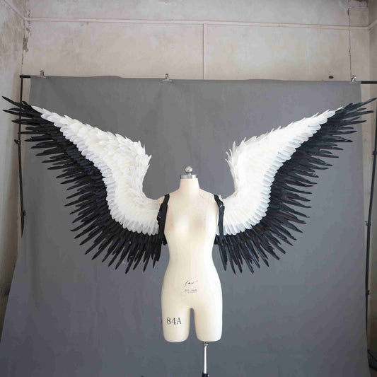 Our black white angel wings from the front. Made from goose feathers. Wings for angel wings costume or devil wings costume. Suitable for photoshoots.