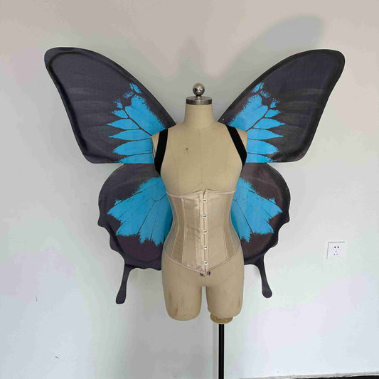 Our blue black butterfly wings from the front. Made from cloth. Can be also named fairy wings or pixie wings.