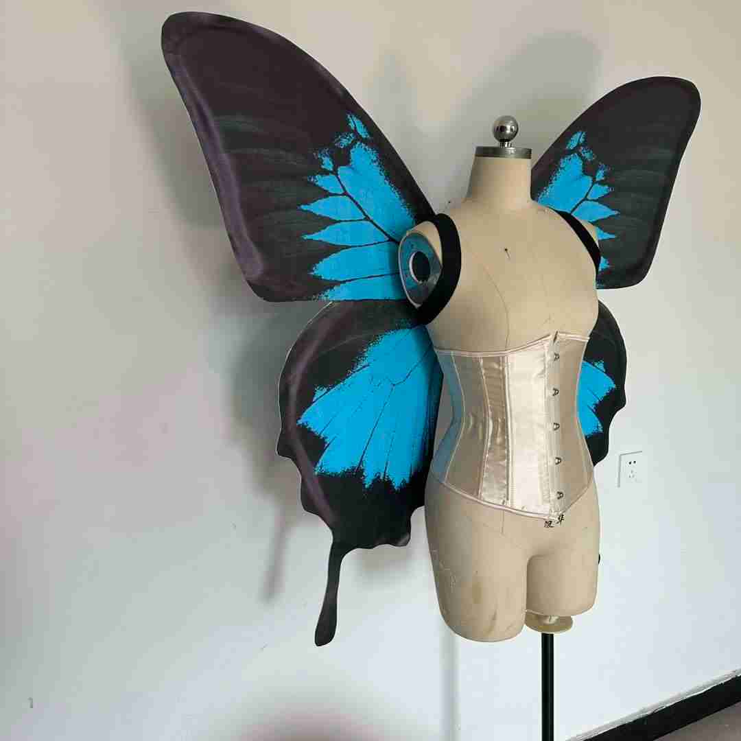Our blue black butterfly wings from the right. Made from cloth. Can be also named fairy wings or pixie wings.