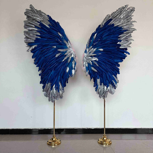 Our silver blue angel wings on poles from the front. Made from goose feathers. Wings for decoration. Suitable for restaurant, cafe, night club, event decorations.