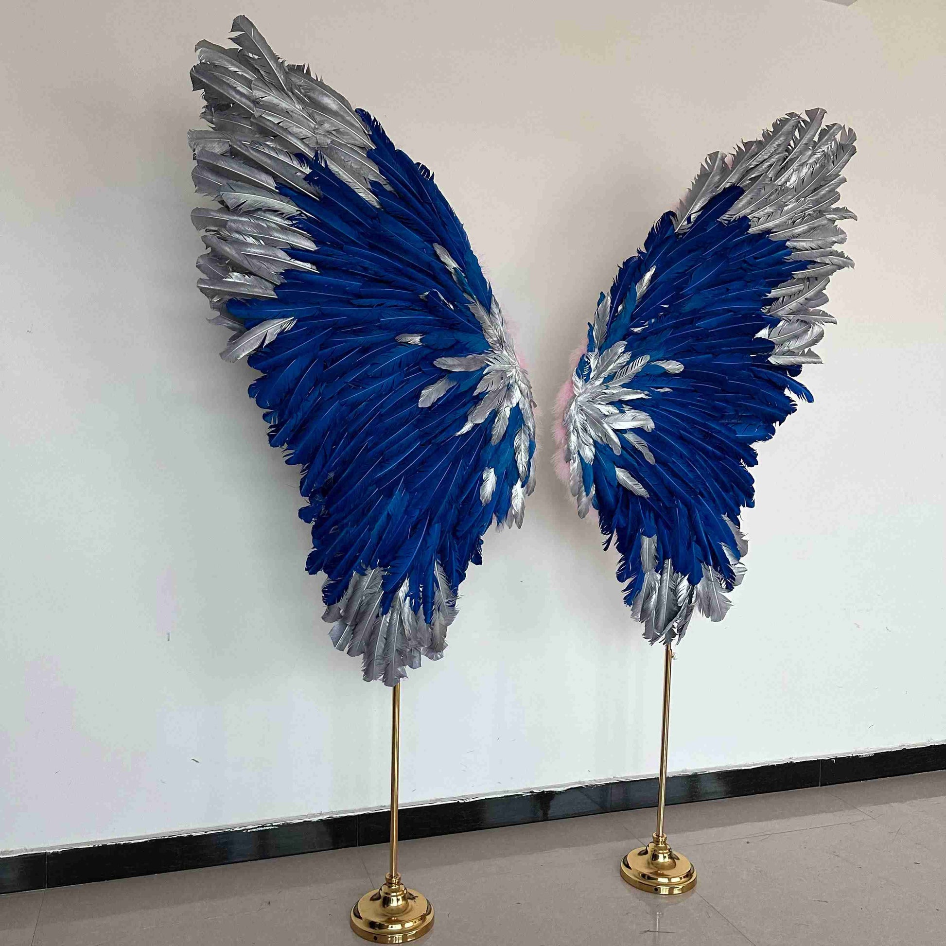Our silver blue angel wings on poles from the right side. Made from goose feathers. Wings for decoration. Suitable for restaurant, cafe, night club, event decorations.