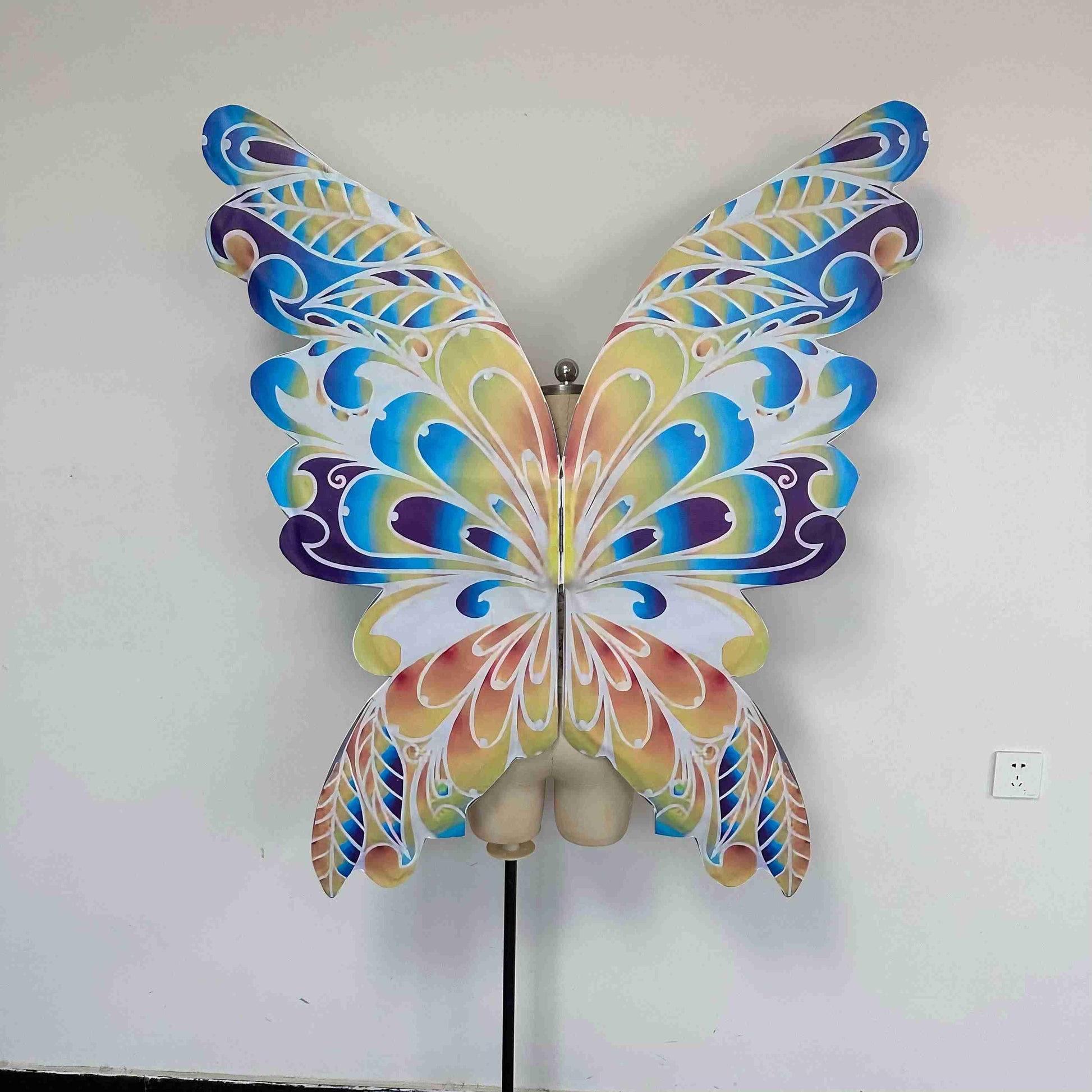 Our colorful dream butterfly wings from the back. Made from cloth. Can be also named fairy wings or pixie wings.