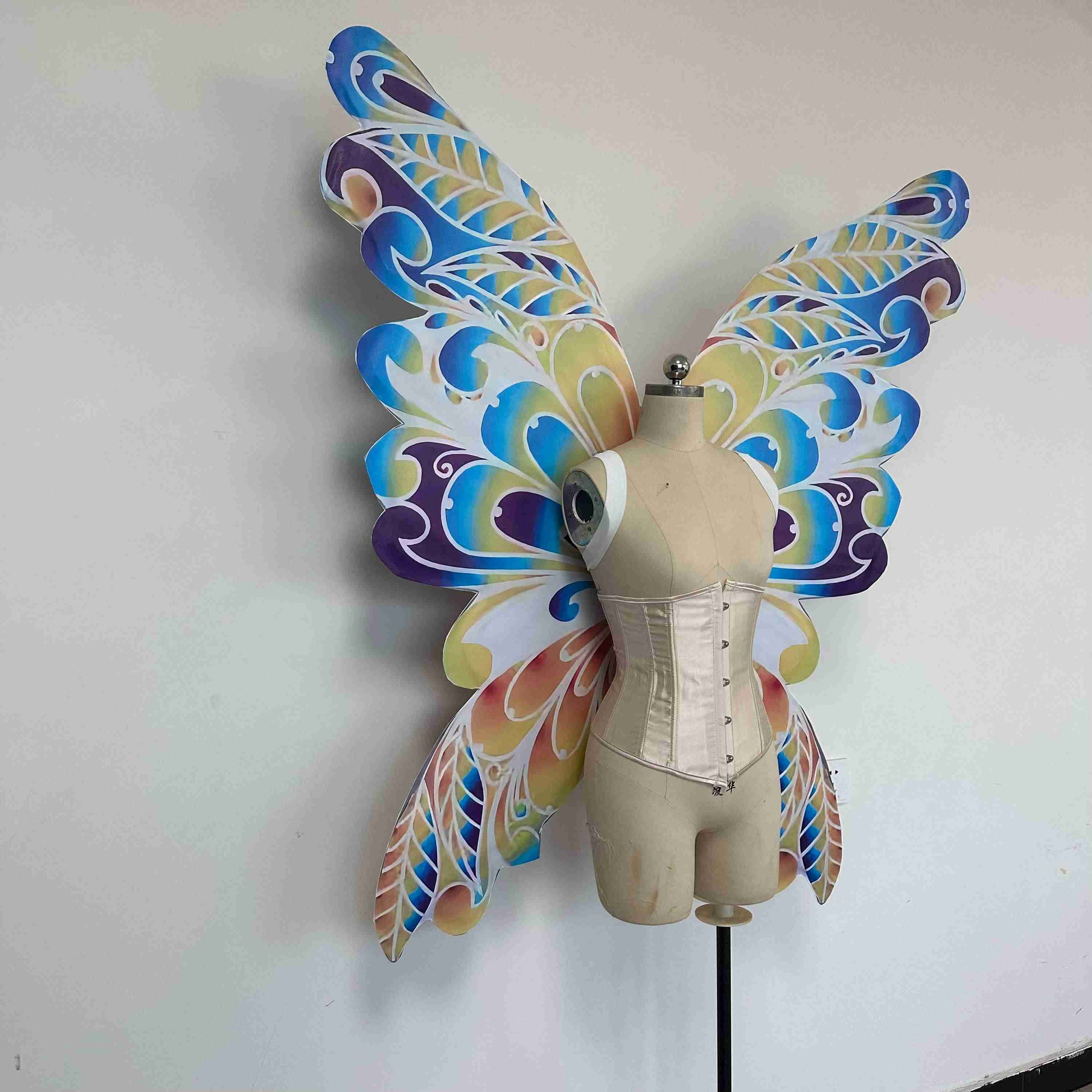 Our colorful dream butterfly wings from the right side. Made from cloth. Can be also named fairy wings or pixie wings.