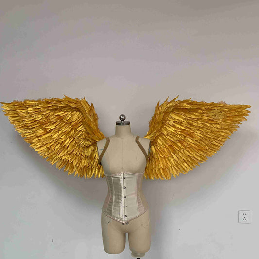 Our golden angel wings from the front. Made from goose feathers. Wings for angel costume. Suitable for photoshoots.