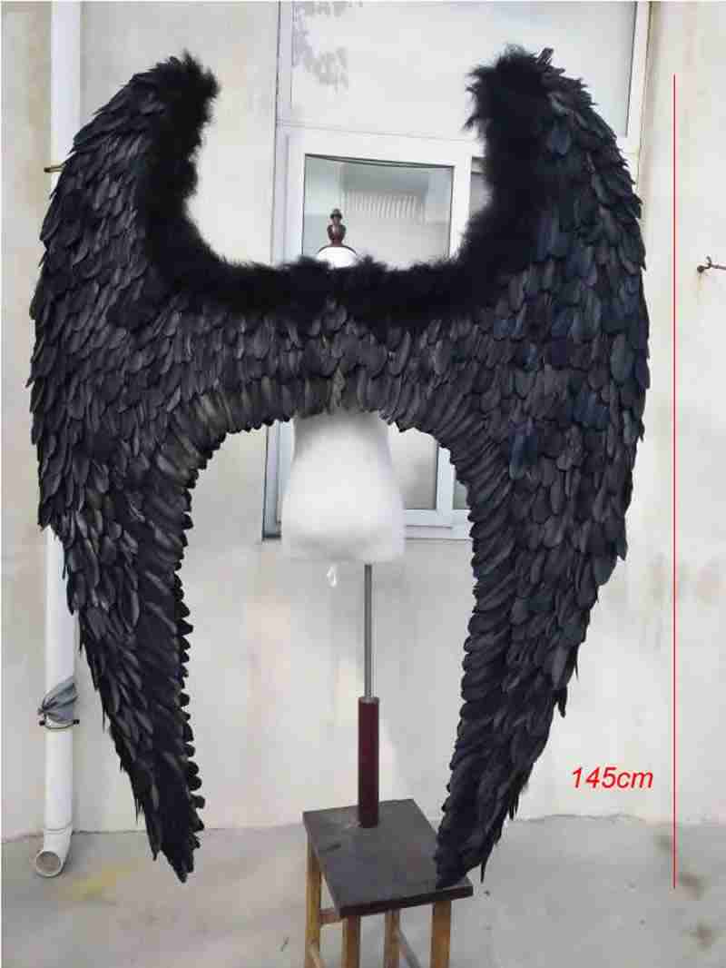 Our dark angel wings from the back. Made from goose feathers. Wings for angel costume or devil costume. Suitable for photoshoots.