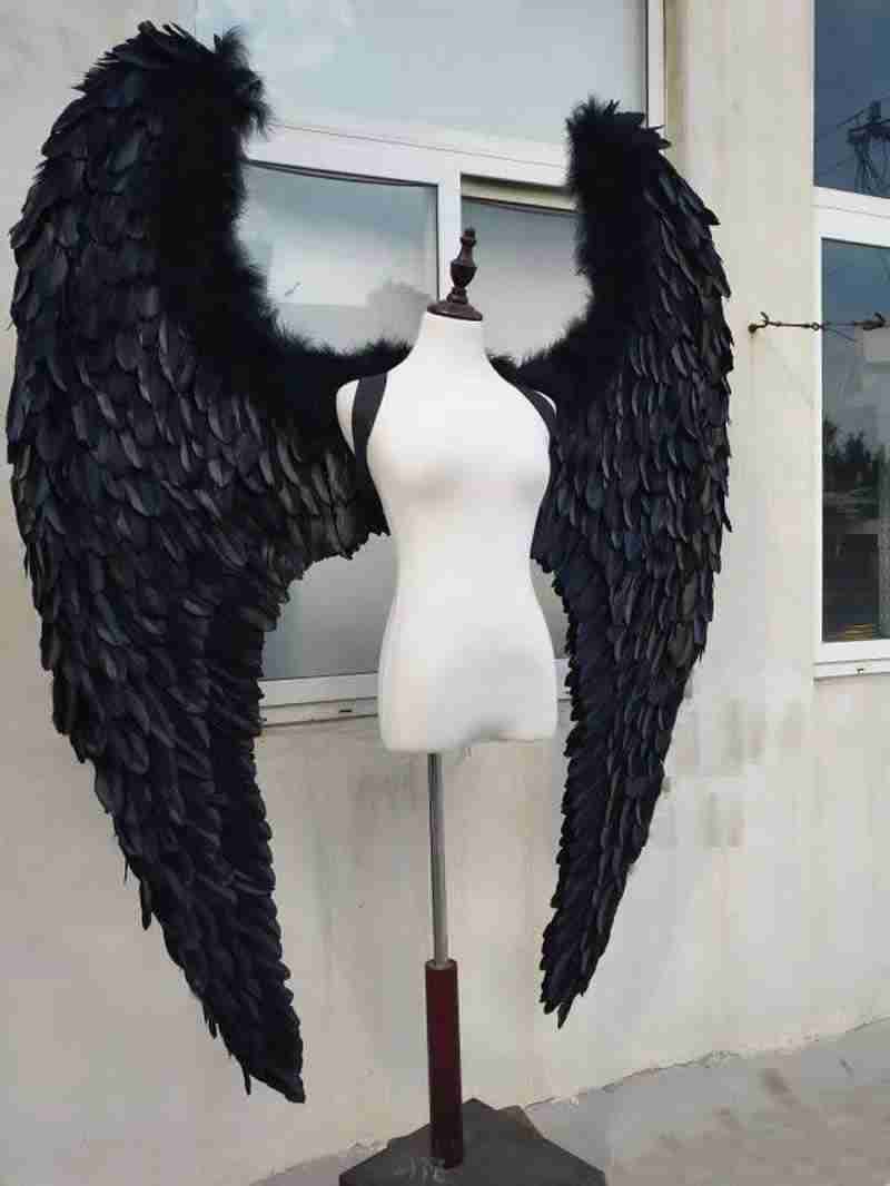 Our dark angel wings from the right side. Made from goose feathers. Wings for angel costume or devil costume. Suitable for photoshoots.