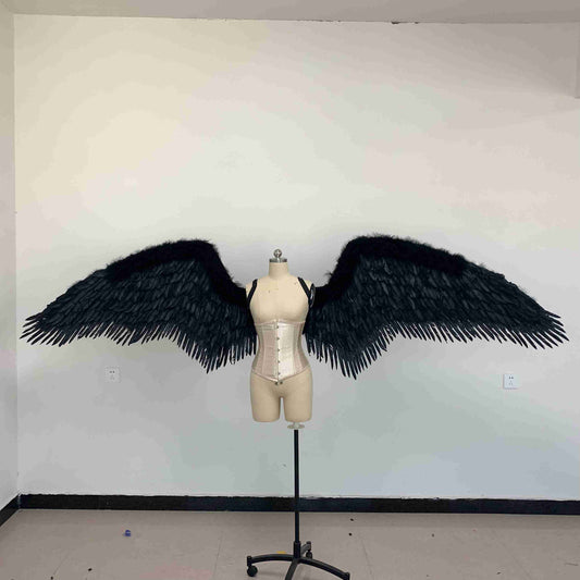 Our black fallen angel wings from the front. Made from goose feathers. Wings for the devil or fallen angel costume. Suitable for photoshoots.