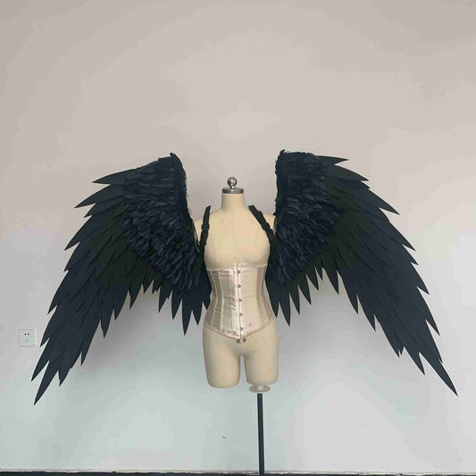 Our black color angel wings from the front. Made from EVA foam and goose feathers. Wings for angel costume or devil costume. Suitable for photoshoots.