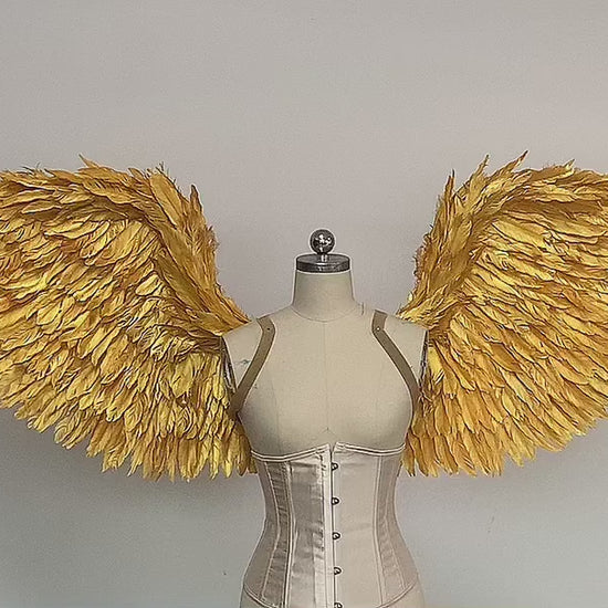 Our golden angel wings video. Made from goose feathers. Wings for angel costume. Suitable for photoshoots.