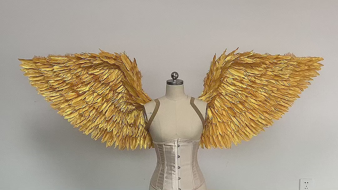 Our golden angel wings video. Made from goose feathers. Wings for angel costume. Suitable for photoshoots.