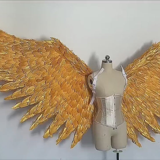 Our big golden angel wings video. Made from goose feathers. Wings for angel costume. Suitable for photoshoots.