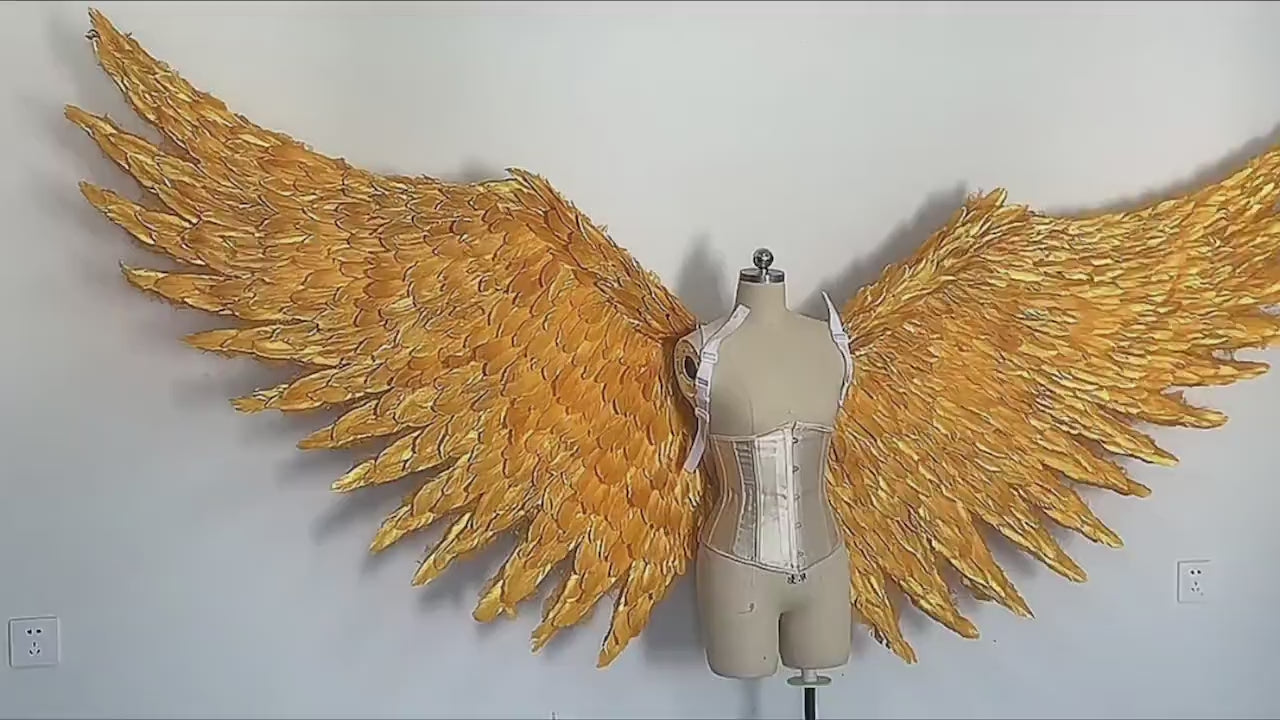 Our big golden angel wings video. Made from goose feathers. Wings for angel costume. Suitable for photoshoots.