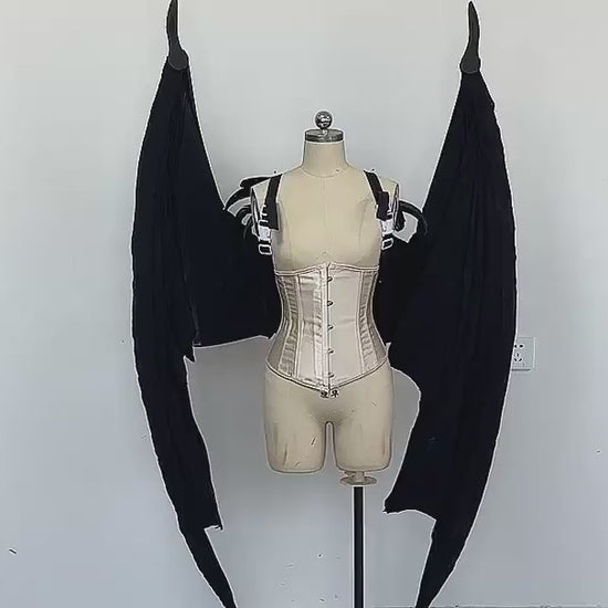 Our large black color devil wings video. Wings are moveable and can control extension and folding remotely. Made from aluminum alloy and cloth. Wings for fallen angel costume or devil costume. Suitable for fantasy photoshoots or events.