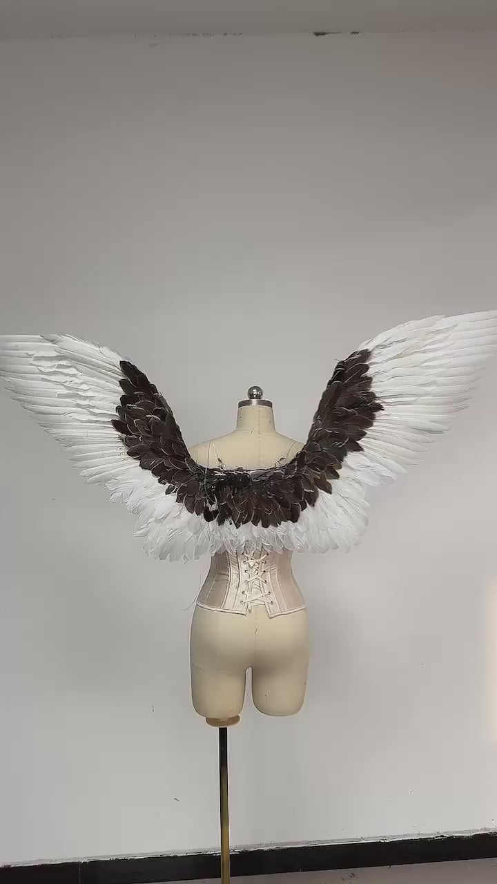 Our white gray angel wings video. Made from goose feathers. Wings for angel wings costume. Suitable for photoshoots.
