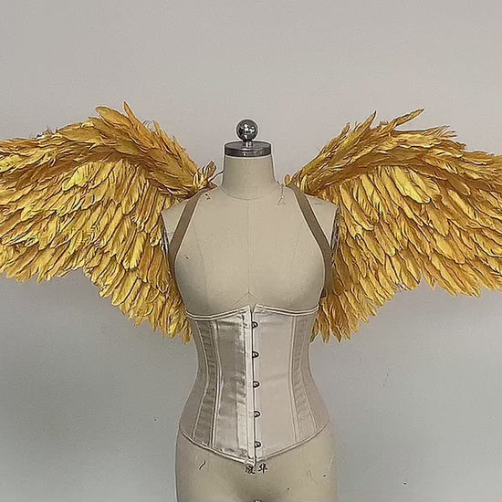 Our small golden angel wings video. Made from goose feathers. Wings for angel costume. Suitable for photoshoots.