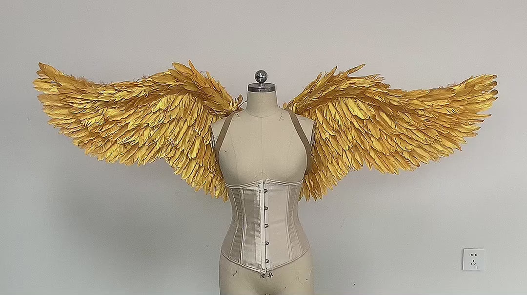 Our small golden angel wings video. Made from goose feathers. Wings for angel costume. Suitable for photoshoots.