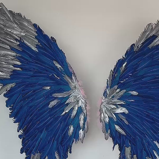 Our silver blue angel wings on poles video. Made from goose feathers. Wings for decoration. Suitable for restaurant, cafe, night club, event decorations.