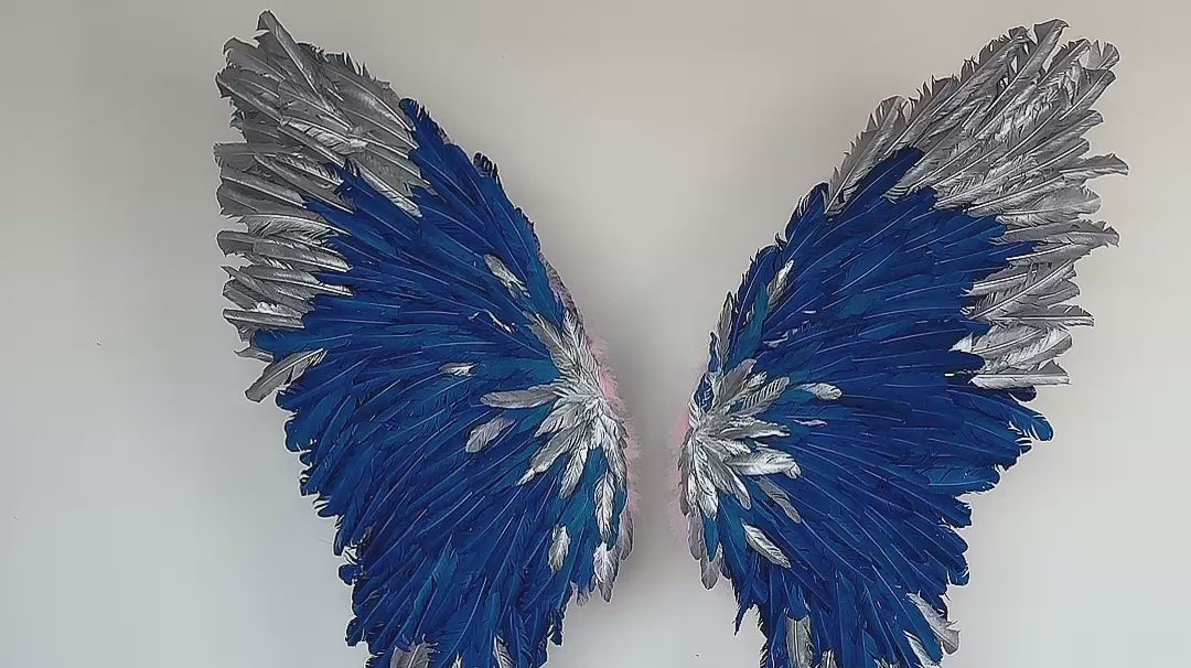 Our silver blue angel wings on poles video. Made from goose feathers. Wings for decoration. Suitable for restaurant, cafe, night club, event decorations.