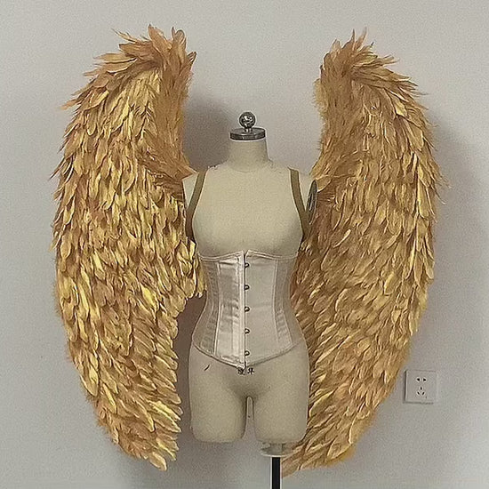Our golden color angel wings video. Made from goose feathers. Wings for angel costume. Suitable for photoshoots.