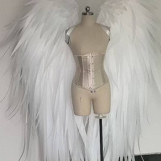 Our white angel wings video. Made from pearl cotton foam and some goose feathers. Wings for angel costume. Suitable for photoshoots.