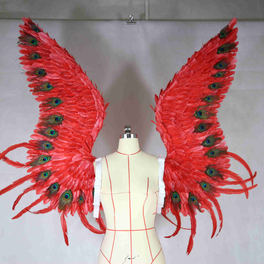 Our red peacock angel wings from the front. Made from goose feathers and peacock feathers. Wings for angel wings costume. Suitable for photoshoots.