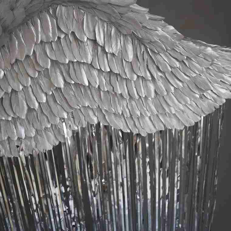 Our silver angel wings from the near view. Made from goose feathers. Wings for angel wings costume. Suitable for photoshoots.
