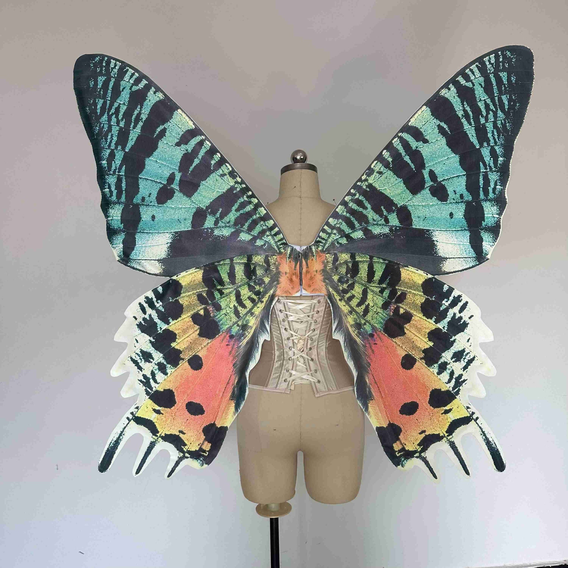 Our sky orange butterfly wings from the back. Made from cloth. Can be also named fairy wings or pixie wings.