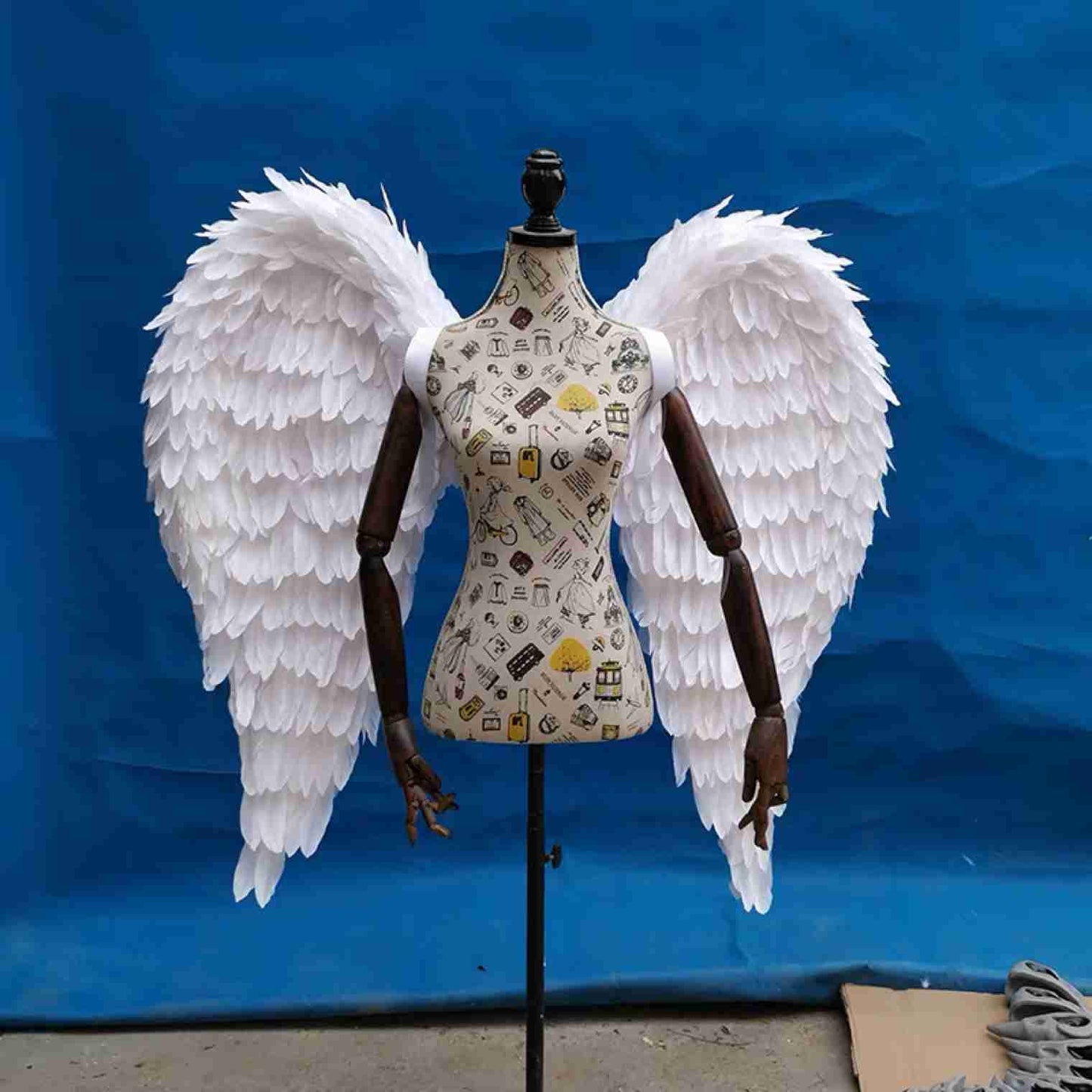 Our little white color angel wings from the front. Made from goose feathers. Wings for angel costume. Suitable for photoshoots.