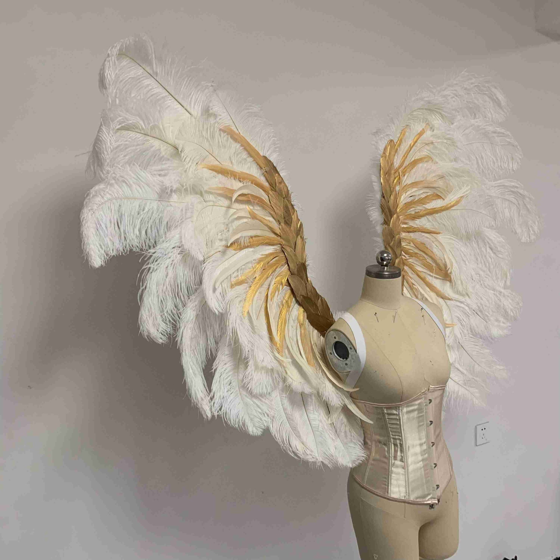 Our royal white angel wings from the right side. Made from ostrich feathers. Wings for angel costume. Suitable for boudoir photoshoots.