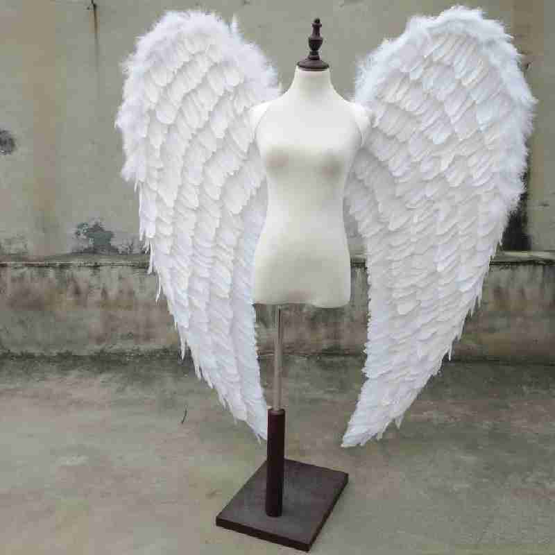 Our white angel wings from the front. Made from goose feathers. Wings for angel costume. Suitable for photoshoots.