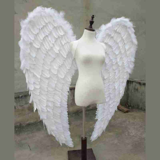 Our white angel wings from the right side. Made from goose feathers. Wings for angel costume. Suitable for photoshoots.